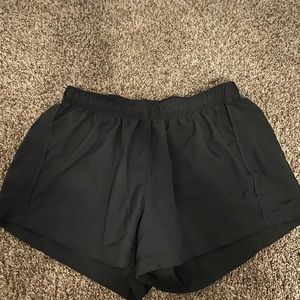 new balance black shorts (size M)